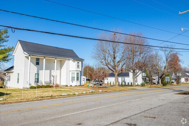 Traditional homes made of wood are located around the main center of town in Orlinda.