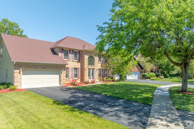 Mature trees provide shade for West Wind residents.
