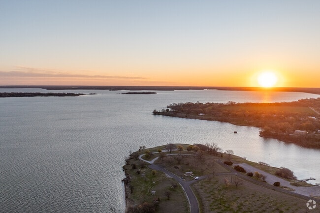 Take in a serene sunrise at one of the many parks around Lavon's lake.