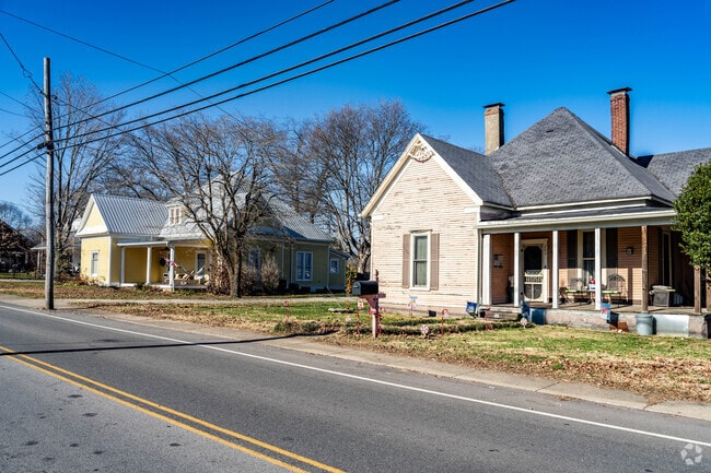 You can find historic Farmhouses in Portland, TN.