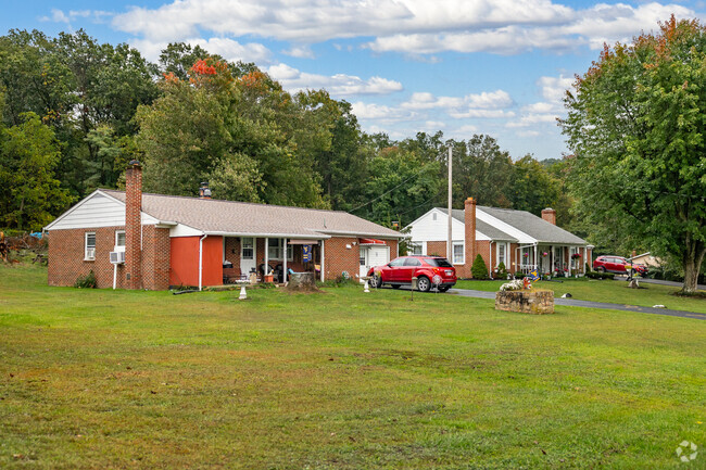 A quaint row of ranch style homes on a quiet rural road in Mt. Lena.