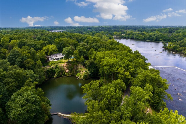 Homes sit atop rolling hills along the James River in Southhampton, Richmond, VA.