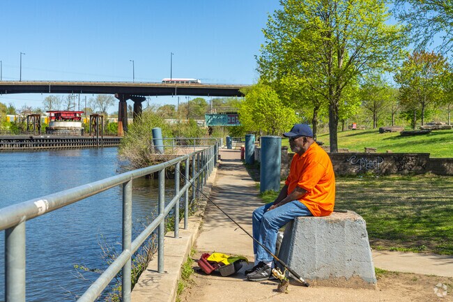 You'll often see people fishing on the Schuylkill River at Grays Ferry Crescent Trail Park.