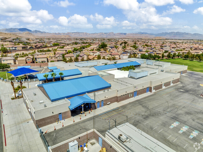 Charles & Phyllis Frias Elementary School is distinguished by its blue-colored roofs.