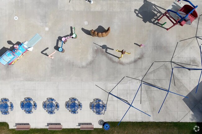 The spray features at Memorial Park in Juniata cast a wide array of patterns in water.