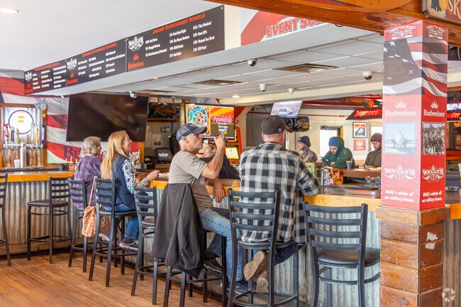 Wally’s Pub serves casual fare and live music near Hampton Beach.