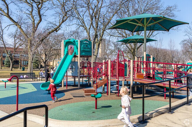 Families in Schorsch Village can enjoy the spacious playground at Shabbona Park.