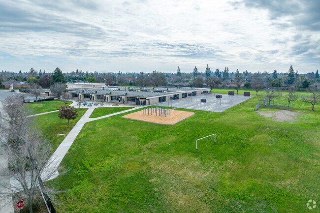 Play outdoors at Charles Peck Elementary School.