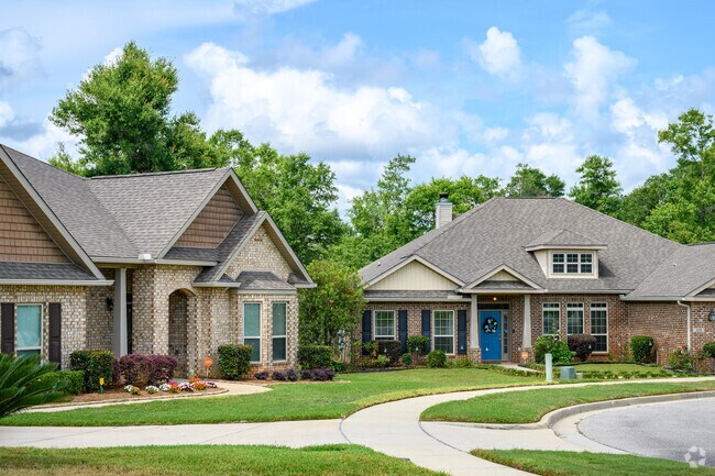 Newer brick homes add modern charm to Pinewood’s tree-lined streets.