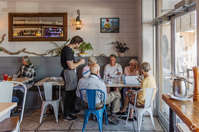 Dine with friends and family at IOP Raw Bar for an excellent dinner on Isle of Palms.