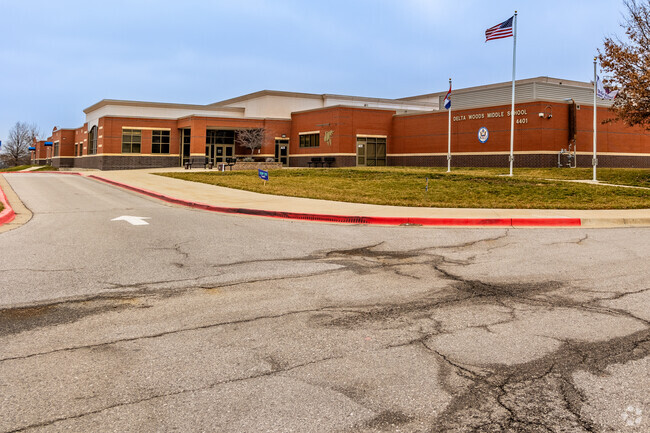 delta WoodsaDelta Woods Middle School is located at the heart of suburban Lees Summit.
