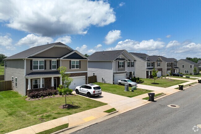 You can find newer traditional homes with well-manicured lawns throughout the community.