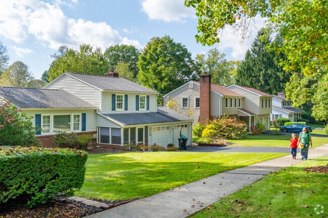 Families safely walk the sidewalks and comfortable neighborhood streets in State College South.