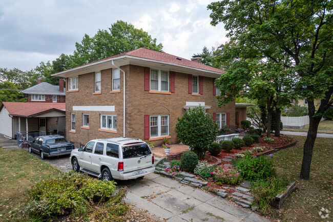 It’s common to see quaint brick homes with detached garages at the end of narrow driveways.