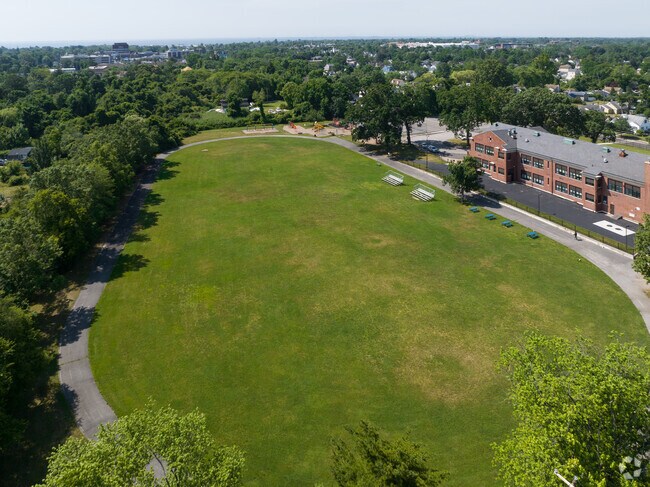 Brook Ave Elementary School has its own track and field behind it.