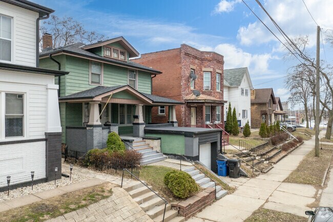 Single family American Foursquares sit alongside duplexes and other home styles in The 9th Ward.