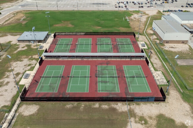 Southwest High School students ace their game on the vibrant courts.