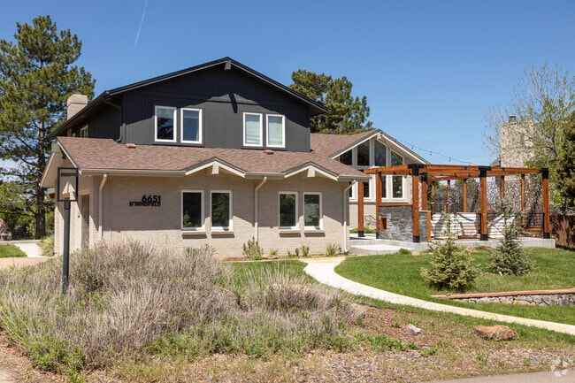 The curb appeal on this modern craftsman style home in The Pinery is off the charts.