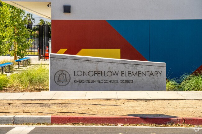 The signage at the entrance of Longfellow Elementary School proudly displays its name.