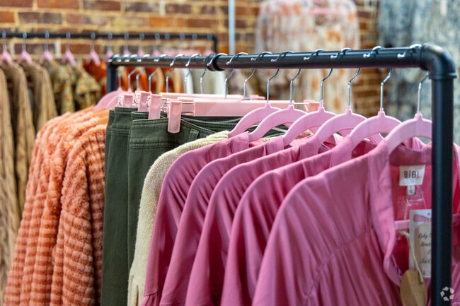 Shoppers in Brannon Crossing head down to Ruby Mae's Boutique and Tea Room for cozy sweaters and stylish accessories.