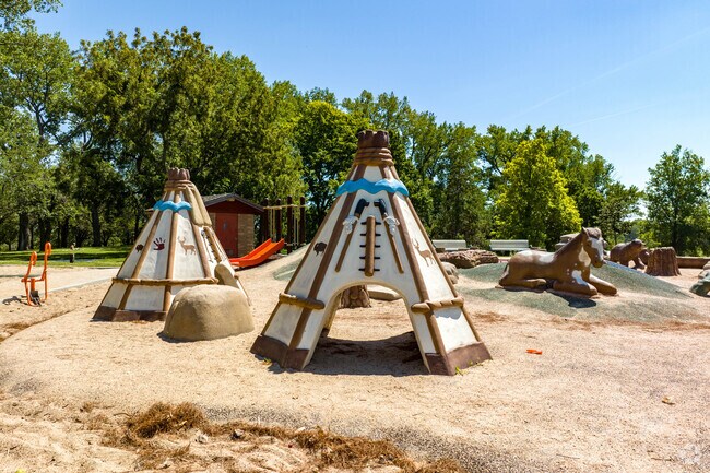 Standing Bear Lake Park is home to a large playground and miles of trails for walking.