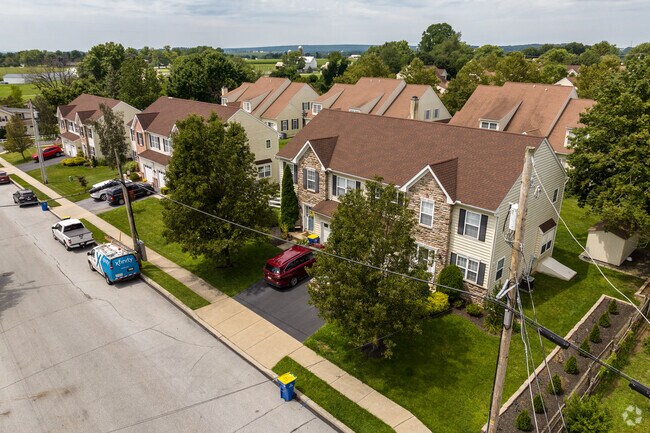 Newer duplexes live in harmony with older farmhouse-style homes in Honey Brook.