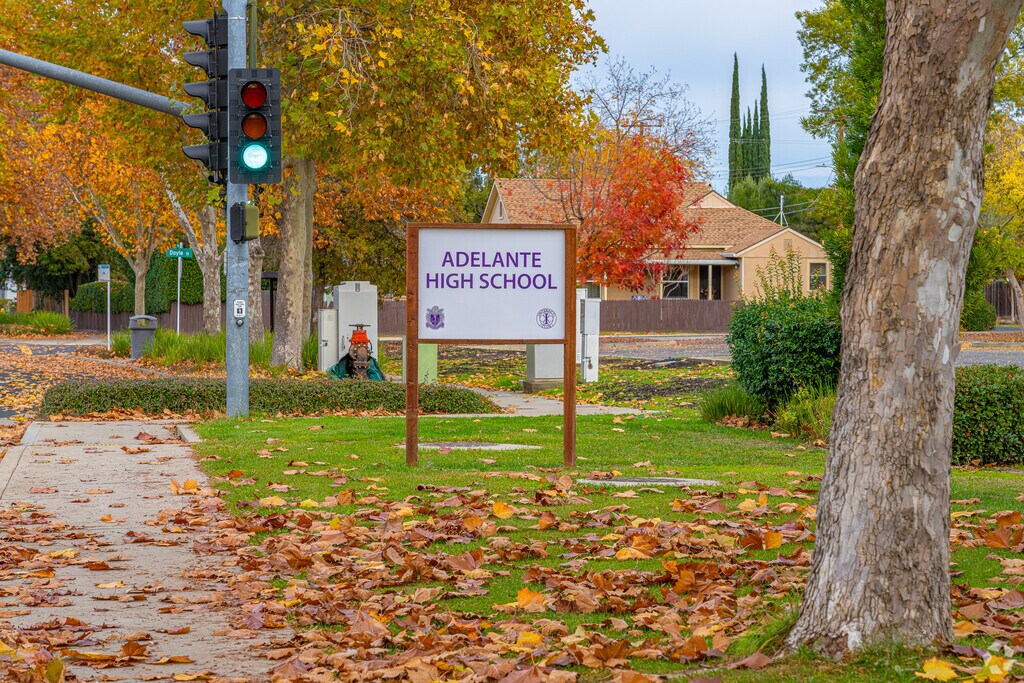 Adelante High (Continuation) School sign welcomes students to come and learn.