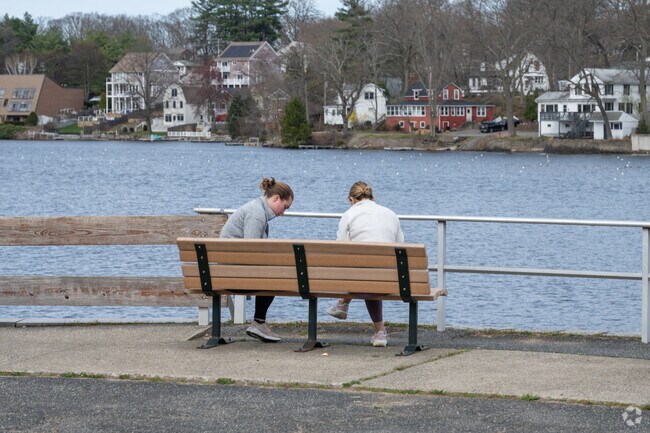 A few ladies relax at Quinsigamond State Park in Worcester.