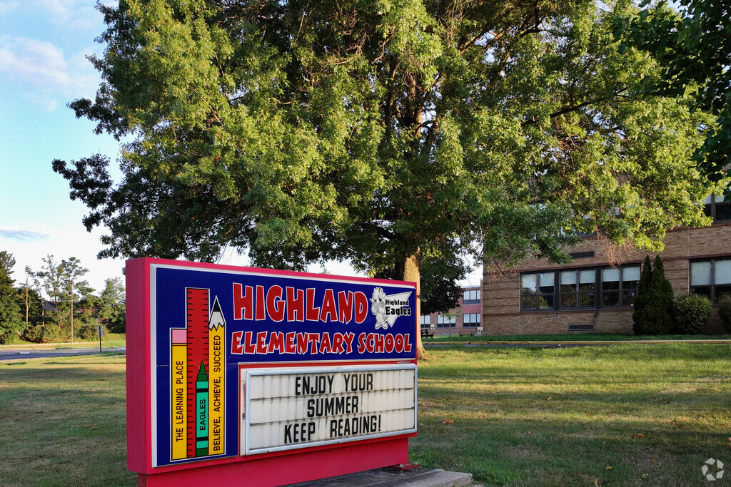 The Highland Elementary School sign welcome faculty, students, and parents.