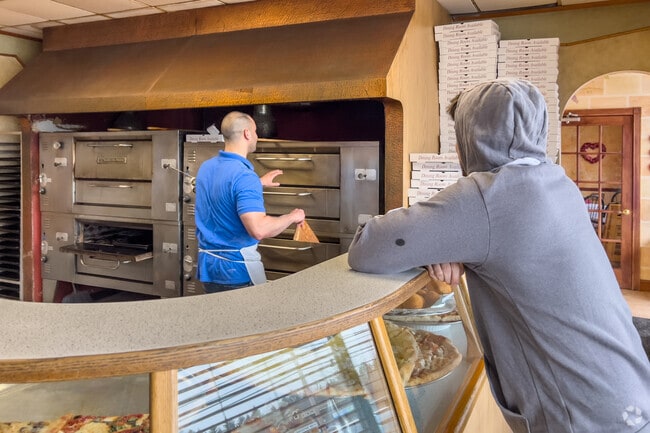 Grab yourself a fresh slice at Dusals Pizza.