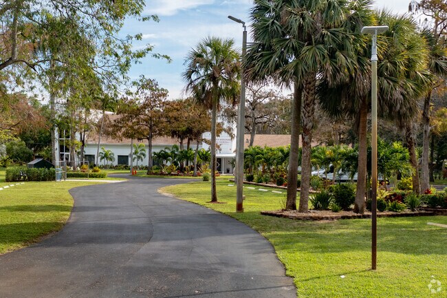 Lush landscaping at Elite Academy School of Excellence in Oakland Park, FL.