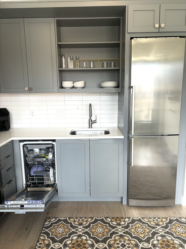 Kitchen has all stainless steel appliances, a dishwasher, and plenty of cabinet space!