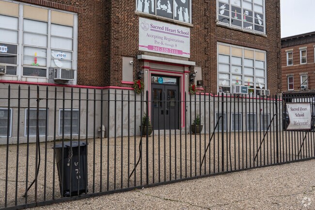 The Sacred Heart School is rather small with no visible exterior facilities.