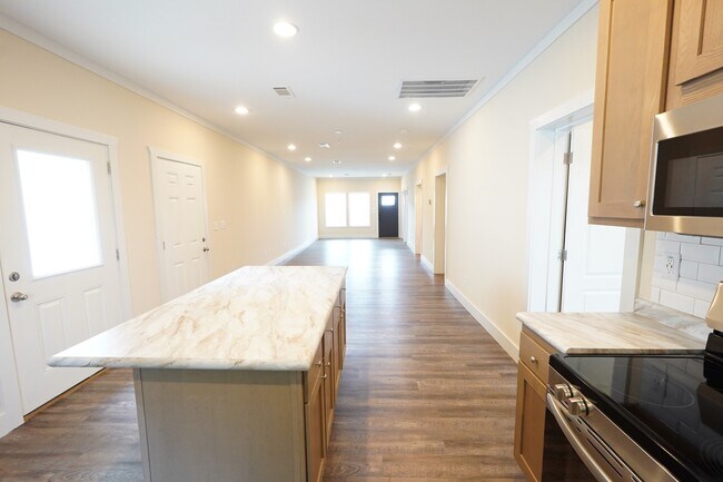 Kitchen View into Living Room without Furniture