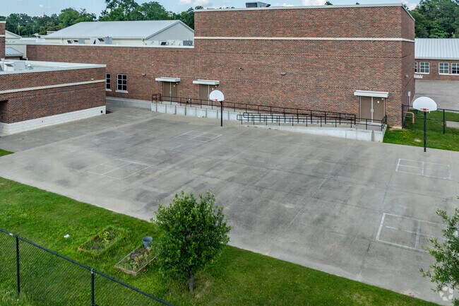The basketball court at Jones Elementary beckons active children at recess.