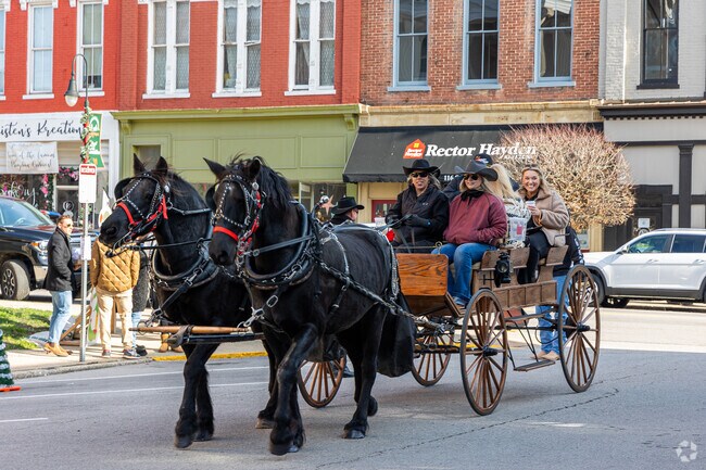 Area residents enjoy carriage rides, caroling, and hot cocoa at the Old Fashioned Christmas.