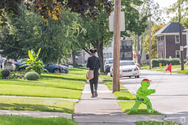Wide sidewalks and paved pathways wind throughout the Newburgh Heights neighborhood.