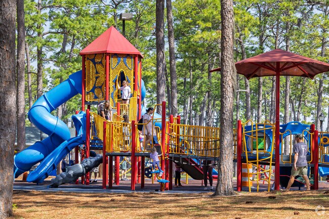 Children of all ages from Greenville Loop enjoy the playground at Long Leaf Park.