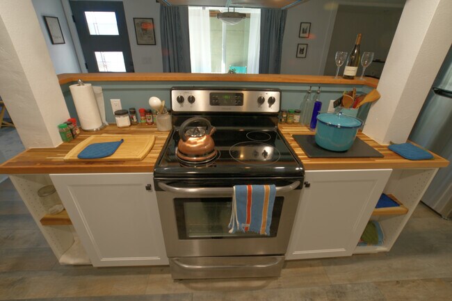 The kitchen island and serving shelf