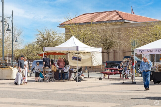 Shoppers explore handmade art at the Farmers & Crafts Market of Las Cruces.
