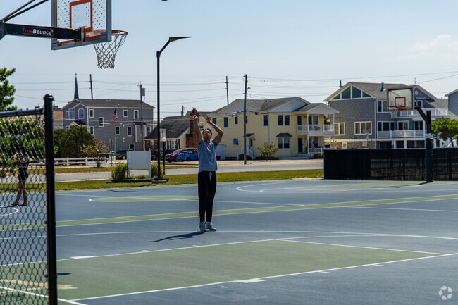 Residents can shoot some hoops while enjoying the sunny weather.