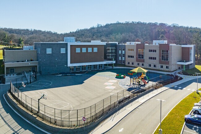 Franklin Regional Intermediate School boasts a fenced-in basketball court and playground.
