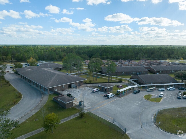 Students are protected from the weather under covered walkways at Wilkinson Elementary School.