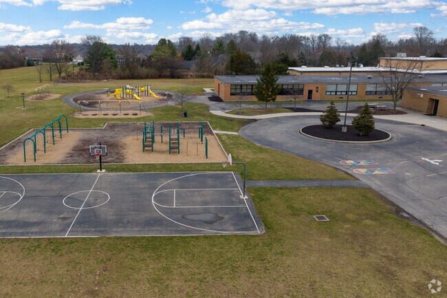 The playgrounds buzzes with activity with students at Concord Elementary playing.