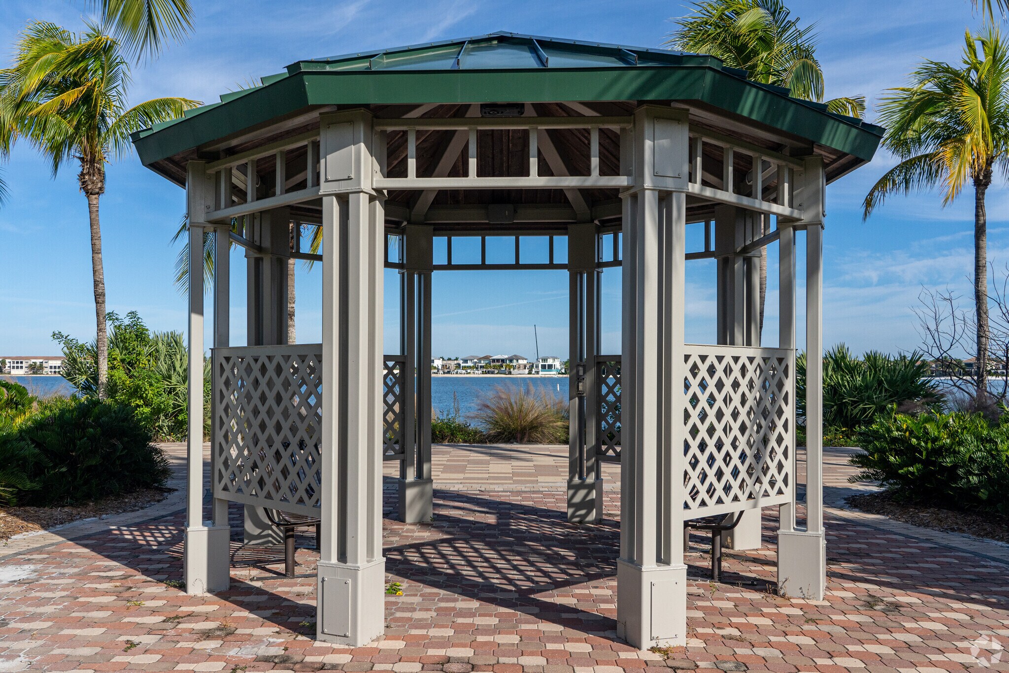 The University Residence in Miromar Lakes has a gazebo for shaded views of Lake Como.