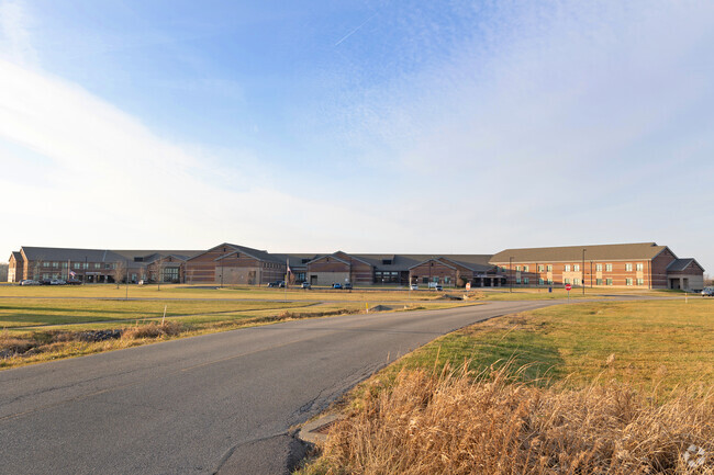 Keystone Middle School's long driveway up to the front entrance.