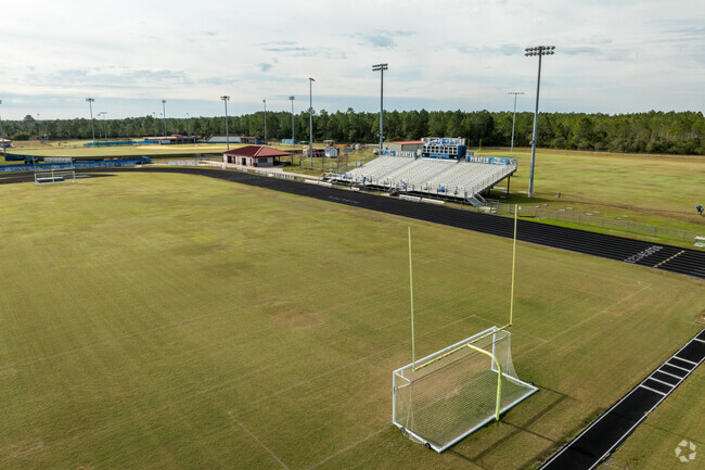 Students play football and soccer for the Matanzas High School Pirates.