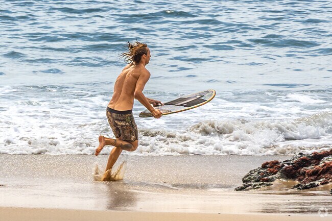 Residents of Coast Royal can easily visit Thousand Steps Beach, a hidden gem with a dramatic staircase leading to a secluded shoreline perfect for sunbathing and skim boarding.