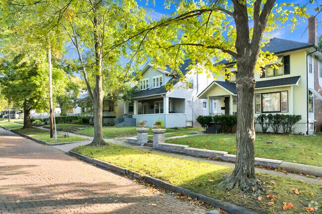 Experience the charm of Near West with this row of inviting homes and tree-lined streets.