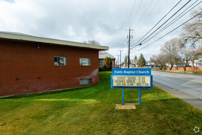 Faith Baptist Academy sits across the street from a large park.